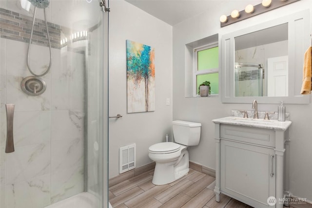 12407 Upper Preston Rd SE, Issaquah, WA 98027 - bathroom featuring a shower stall, vanity, and wood finish floors