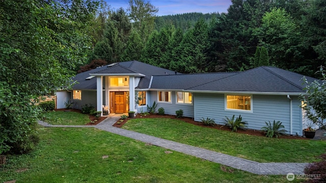 12407 Upper Preston Rd SE, Issaquah, WA 98027 - view of front of home with a front yard, a forest view, and roof with shingles