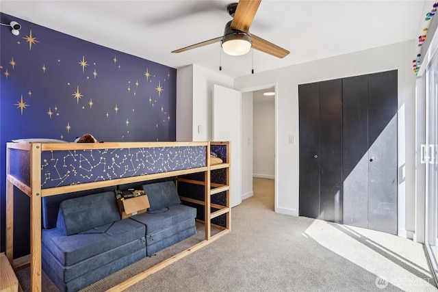 10765 Burke Ave N Unit 14, Seattle, WA 98133 - carpeted bedroom with wallpapered walls and an accent wall