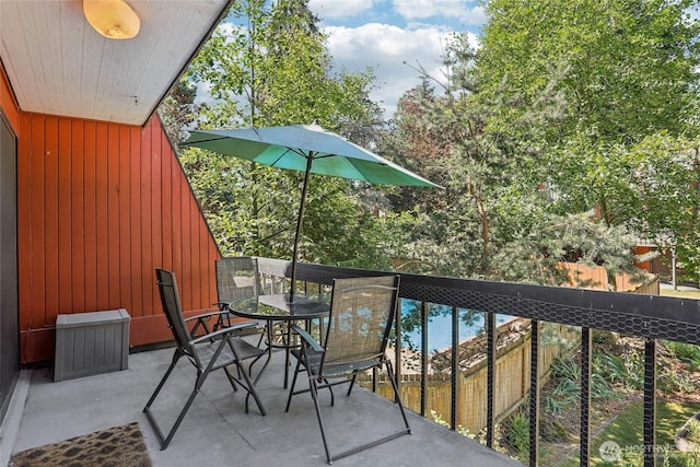 10765 Burke Ave N Unit 14, Seattle, WA 98133 - balcony featuring outdoor dining area
