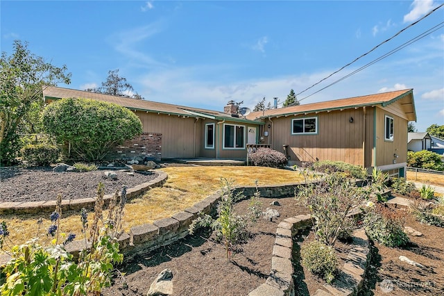 622 119th Ave E, Edgewood, WA 98372 - back of property with a chimney