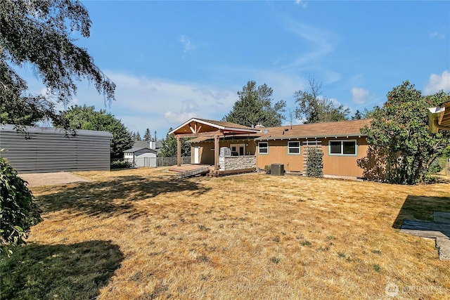 622 119th Ave E, Edgewood, WA 98372 - rear view of property with a patio