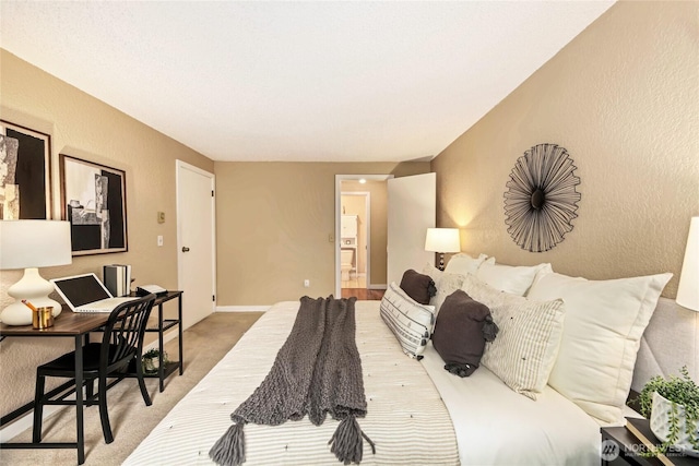 15749 NE 18th St Unit B5, Bellevue, WA 98008 - bedroom with carpet, a textured wall, and ensuite bath
