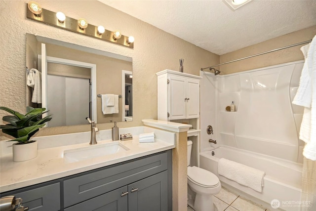 15749 NE 18th St Unit B5, Bellevue, WA 98008 - full bath featuring a textured wall, a textured ceiling, shower / tub combo, vanity, and tile patterned floors