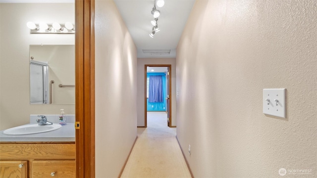 87 Sullivan Pl, Walla Walla, WA 99362 - hallway with a sink and light carpet