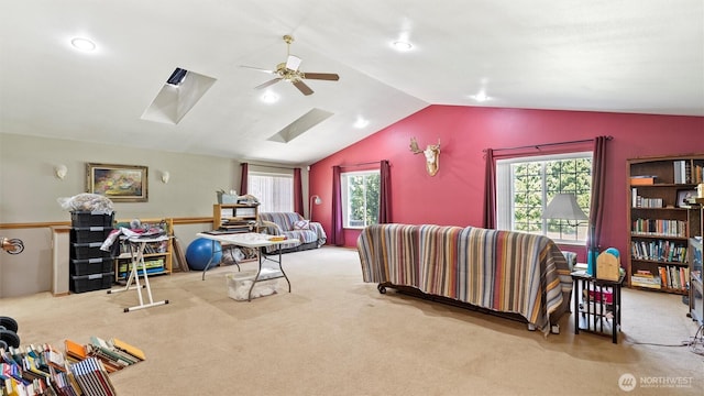 87 Sullivan Pl, Walla Walla, WA 99362 - home theater featuring carpet flooring, vaulted ceiling, a ceiling fan, recessed lighting, and a skylight