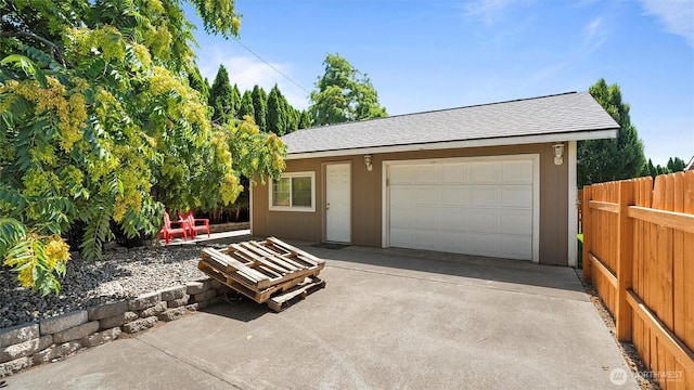 87 Sullivan Pl, Walla Walla, WA 99362 - view of front of home featuring driveway, an outdoor structure, and a shingled roof