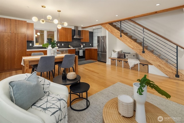 3659 Whitman Ave N, Seattle, WA 98103 - living room with stairway, light wood finished floors, and recessed lighting