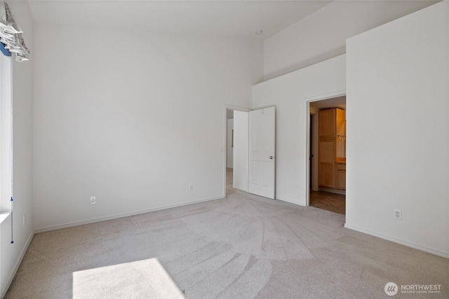22532 43rd Ave S Unit 19-2, Kent, WA 98032 - unfurnished bedroom with carpet flooring, a high ceiling, and ensuite bathroom