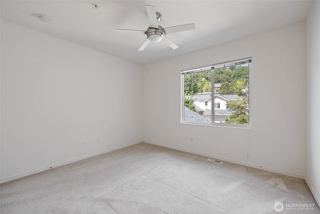 22532 43rd Ave S Unit 19-2, Kent, WA 98032 - empty room featuring light carpet, a smoke detector, ceiling fan, and a pendent fire sprinkler