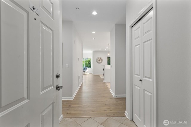 15000 Juanita Dr NE Unit 402, Kenmore, WA 98028 - hall featuring light tile patterned floors and recessed lighting