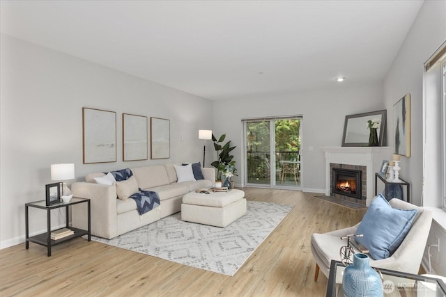 15000 Juanita Dr NE Unit 402, Kenmore, WA 98028 - living room with wood finished floors and a brick fireplace