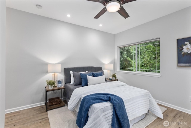 15000 Juanita Dr NE Unit 402, Kenmore, WA 98028 - bedroom featuring wood finished floors, recessed lighting, and a ceiling fan