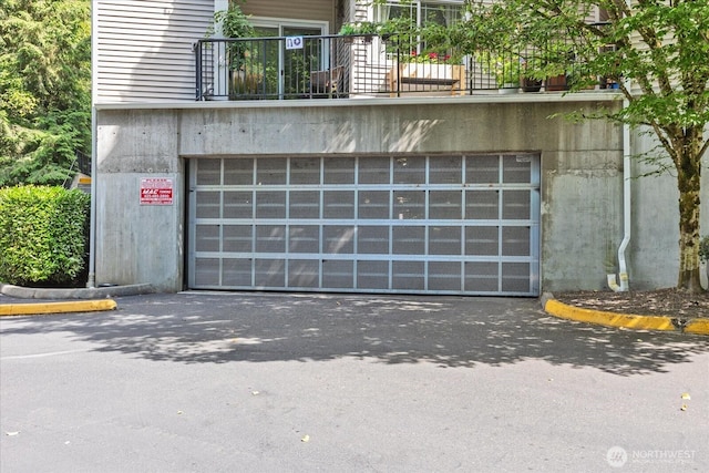 15000 Juanita Dr NE Unit 402, Kenmore, WA 98028 - garage featuring driveway