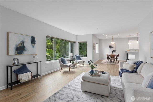 15000 Juanita Dr NE Unit 402, Kenmore, WA 98028 - living room with wood finished floors and recessed lighting