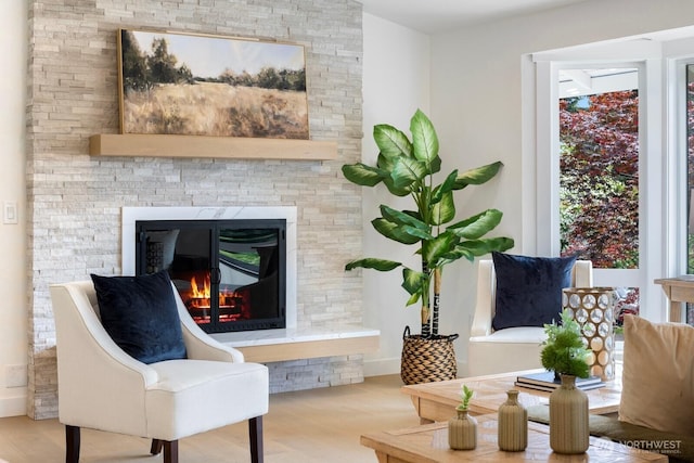 7502 117th Ave NE, Kirkland, WA 98033 - living room with a stone fireplace and wood finished floors