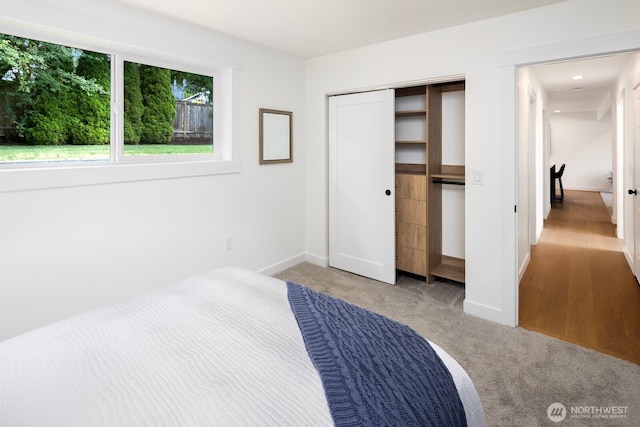 7502 117th Ave NE, Kirkland, WA 98033 - unfurnished bedroom featuring carpet and a closet