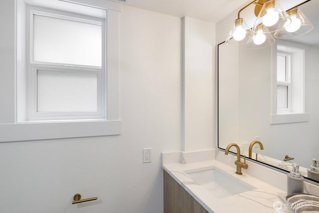 7502 117th Ave NE, Kirkland, WA 98033 - bathroom with vanity and a chandelier