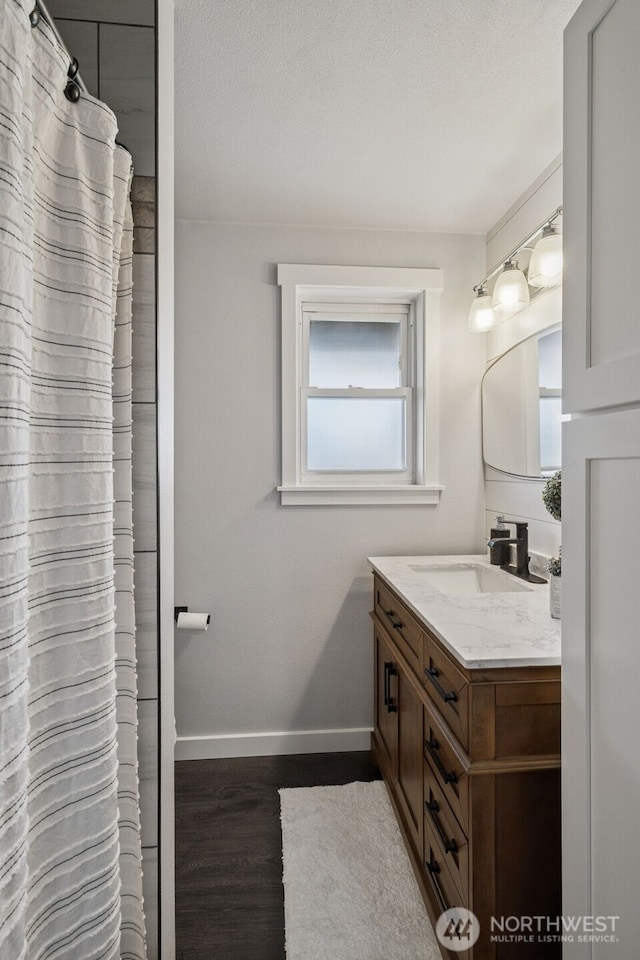2010 Tacoma Rd, Puyallup, WA 98371 - full bathroom featuring vanity and wood finished floors