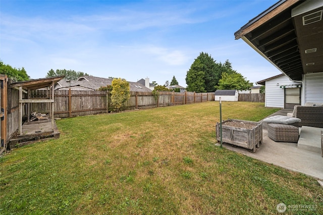 2010 Tacoma Rd, Puyallup, WA 98371 - fenced backyard with a storage shed