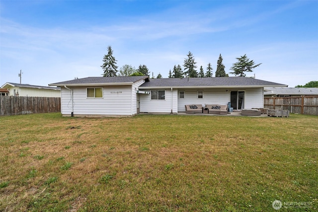 2010 Tacoma Rd, Puyallup, WA 98371 - back of property featuring outdoor lounge area and a patio area