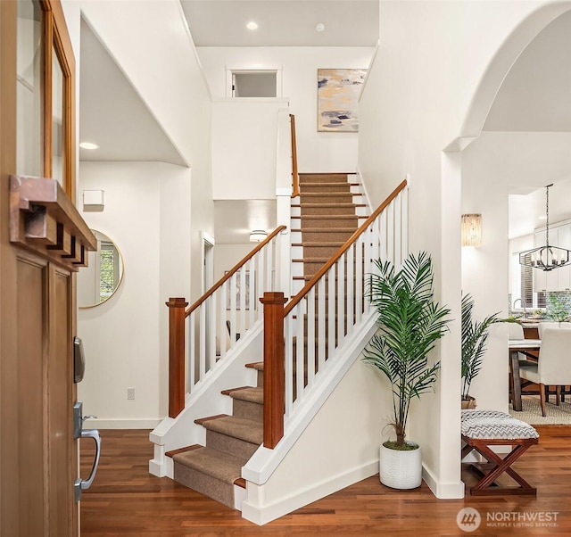 414 10th St S, Kirkland, WA 98033 - stairway with wood finished floors and arched walkways
