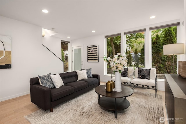 909 29th Ave S, Seattle, WA 98144 - living room featuring wood finished floors and recessed lighting