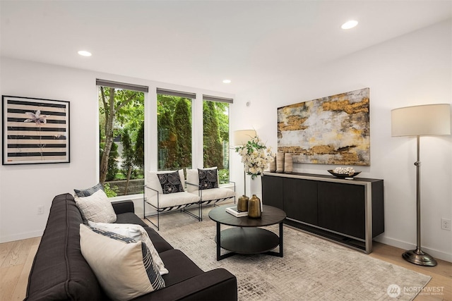 909 29th Ave S, Seattle, WA 98144 - living room with light wood-style floors and recessed lighting
