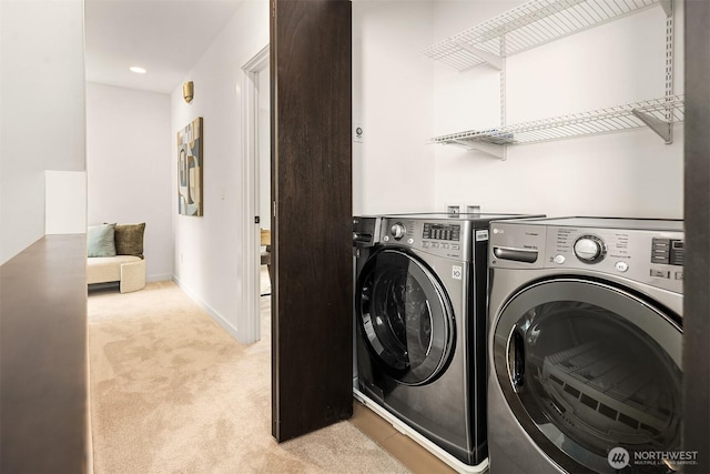 909 29th Ave S, Seattle, WA 98144 - laundry area with separate washer and dryer and light colored carpet