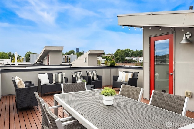 909 29th Ave S, Seattle, WA 98144 - wooden terrace with outdoor dining area and an outdoor hangout area