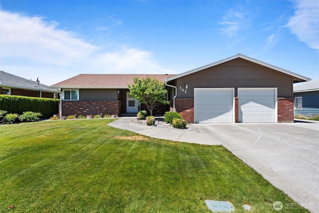 103 Crest Dr, Ephrata, WA 98823 - ranch-style house with brick siding, driveway, a front yard, and a garage