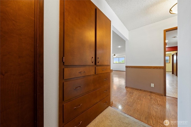 103 Crest Dr, Ephrata, WA 98823 - hallway with light wood finished floors and a textured ceiling