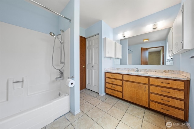 103 Crest Dr, Ephrata, WA 98823 - full bathroom with washtub / shower combination, vanity, and tile patterned flooring