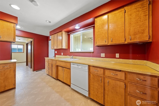 103 Crest Dr, Ephrata, WA 98823 - kitchen with white dishwasher, light countertops, light flooring, brown cabinets, and recessed lighting