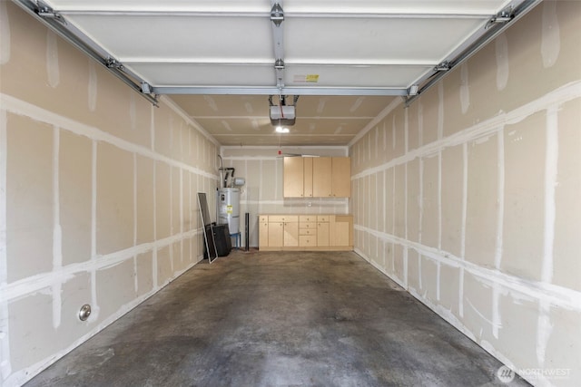 6125 Kennedy Ave SE Unit F7, Auburn, WA 98092 - garage with water heater and a garage door opener