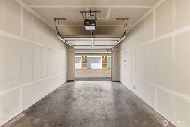 6125 Kennedy Ave SE Unit F7, Auburn, WA 98092 - garage with a garage door opener