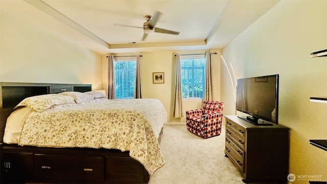 23884 NE 112th Cir Unit 2, Redmond, WA 98053 - bedroom with light carpet, a tray ceiling, and ceiling fan