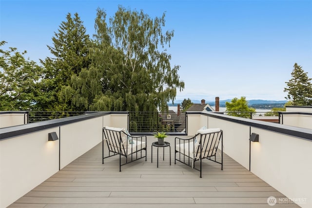 1106C 34th Ave, Seattle, WA 98122 - wooden deck featuring a mountain view