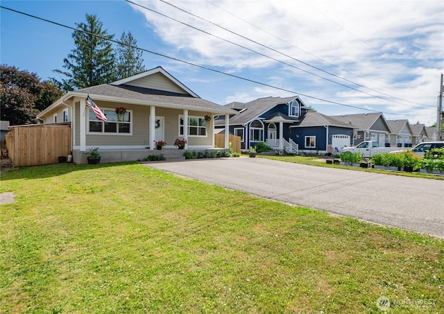 235 Morton St, Sumas, WA 98295 - view of front of home featuring covered porch, a residential view, and driveway