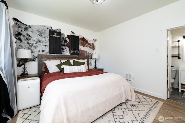 235 Morton St, Sumas, WA 98295 - bedroom featuring wood finished floors and ensuite bath