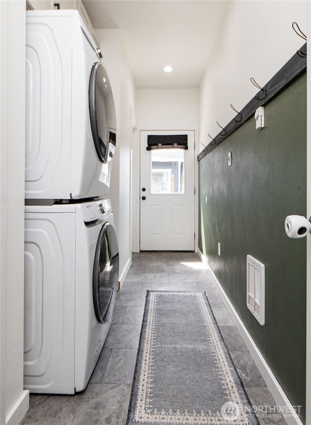 235 Morton St, Sumas, WA 98295 - laundry area featuring stacked washer / dryer and baseboards