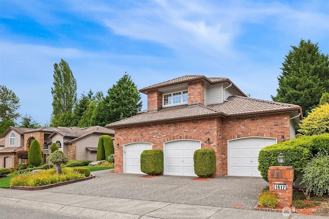 1417 232nd Pl SW, Bothell, WA 98021 - view of front facade featuring a tile roof, asphalt driveway, and brick siding