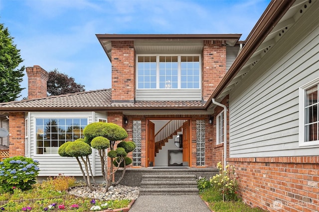 1417 232nd Pl SW, Bothell, WA 98021 - property entrance featuring brick siding and a chimney