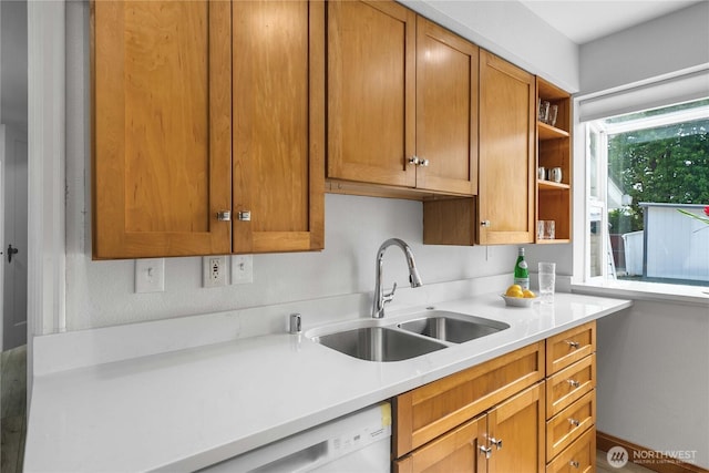 4840 E B St, Tacoma, WA 98404 - kitchen with open shelves, light countertops, dishwasher, and brown cabinetry