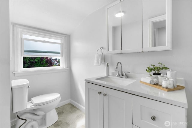4840 E B St, Tacoma, WA 98404 - bathroom featuring lofted ceiling and vanity