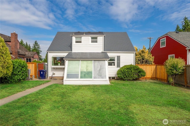 4840 E B St, Tacoma, WA 98404 - rear view of house with a sunroom and roof with shingles