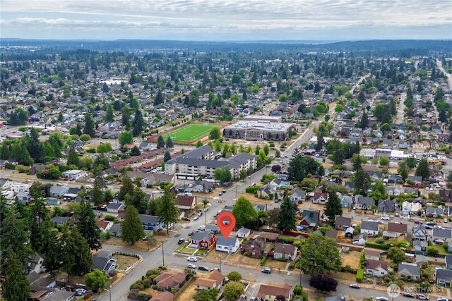 4840 E B St, Tacoma, WA 98404 - aerial view of property and surrounding area featuring nearby suburban area