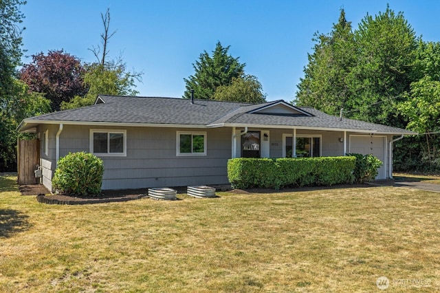 3923 NE 22nd Pl, Renton, WA 98056 - ranch-style house with an attached garage, a front yard, a shingled roof, and driveway
