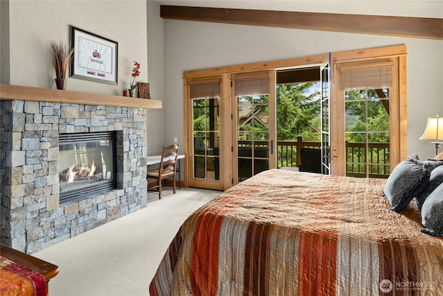 80 Queens Loop, Cle Elum, WA 98922 - carpeted bedroom featuring access to outside and a stone fireplace