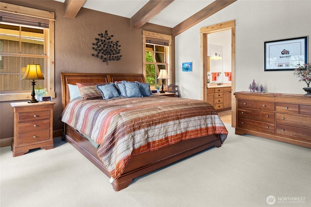 80 Queens Loop, Cle Elum, WA 98922 - bedroom featuring light carpet, beamed ceiling, and ensuite bath